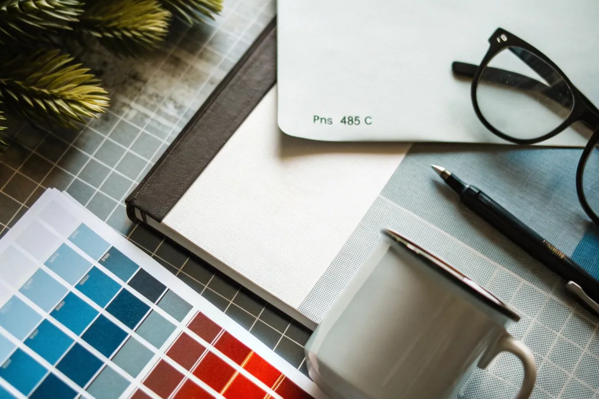 Providing Pantone Solid Coated codes and physical swatches for accurate cafe brand color matching (ID#2)